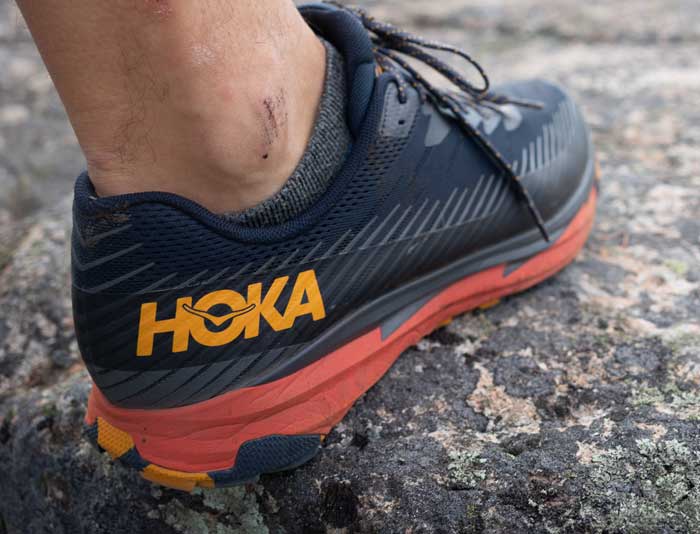 Hoka Torrent 2.0 running shoe on trail
